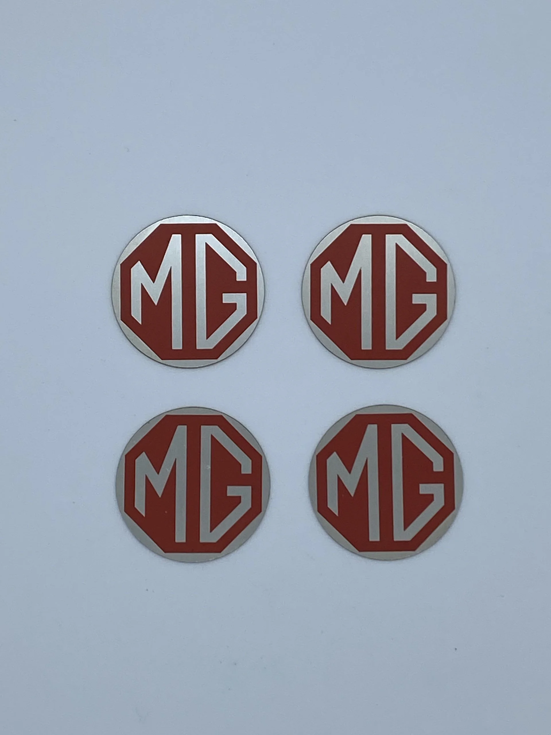 MG METRO WHEEL CENTRE CAP BADGES (4PK)